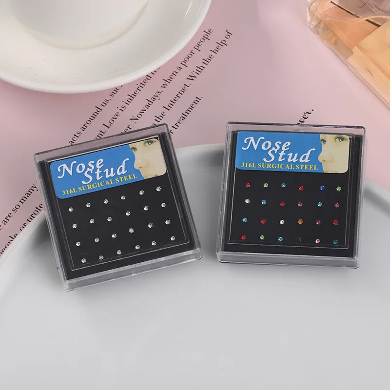 Body Jewelry Jewelry Box - ชุดเครื่องประดับเจาะจมูกสแตนเลสเกรดผ่าตัด 24 ชิ้น/กล่อง ต่างหูจมูกคริสตัล แฟชั่นสำหรับผู้หญิงและเด็กผู้หญิง